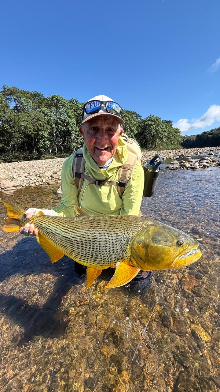 Returning angler Joe with another memorable catch on his second visit to Pluma