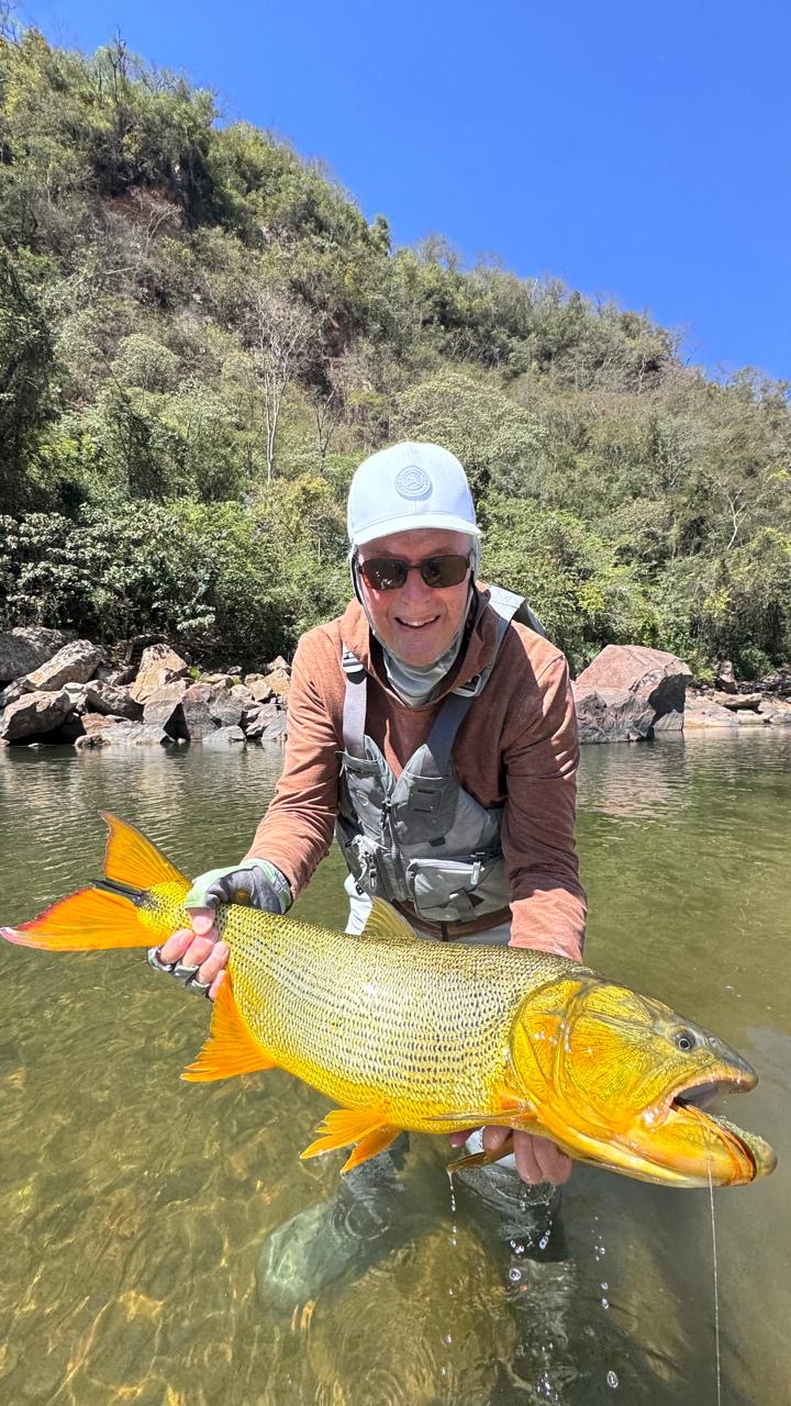 Hillard with his fish after a demanding fight