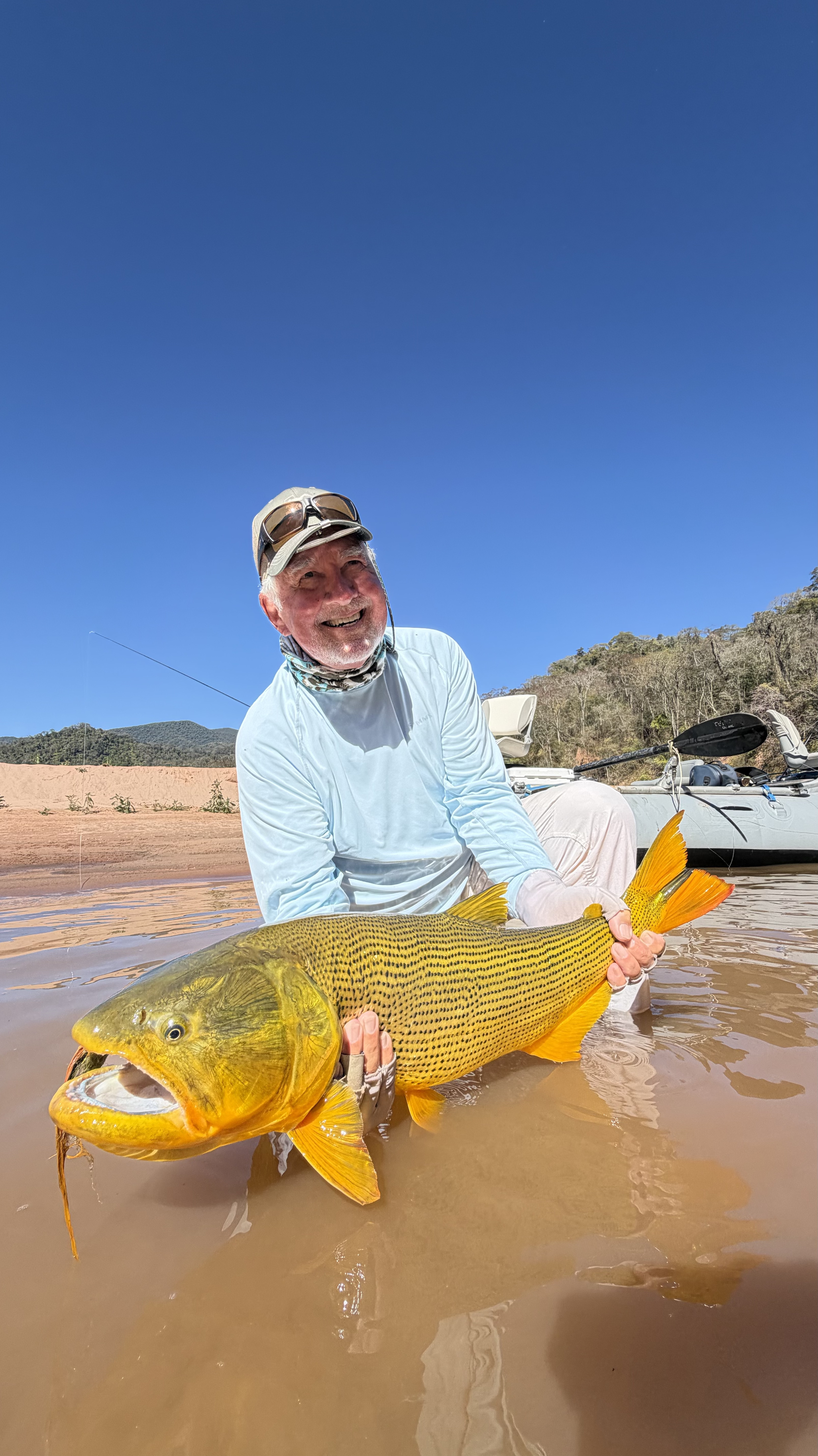 Working the fly from the raft as the action picked up