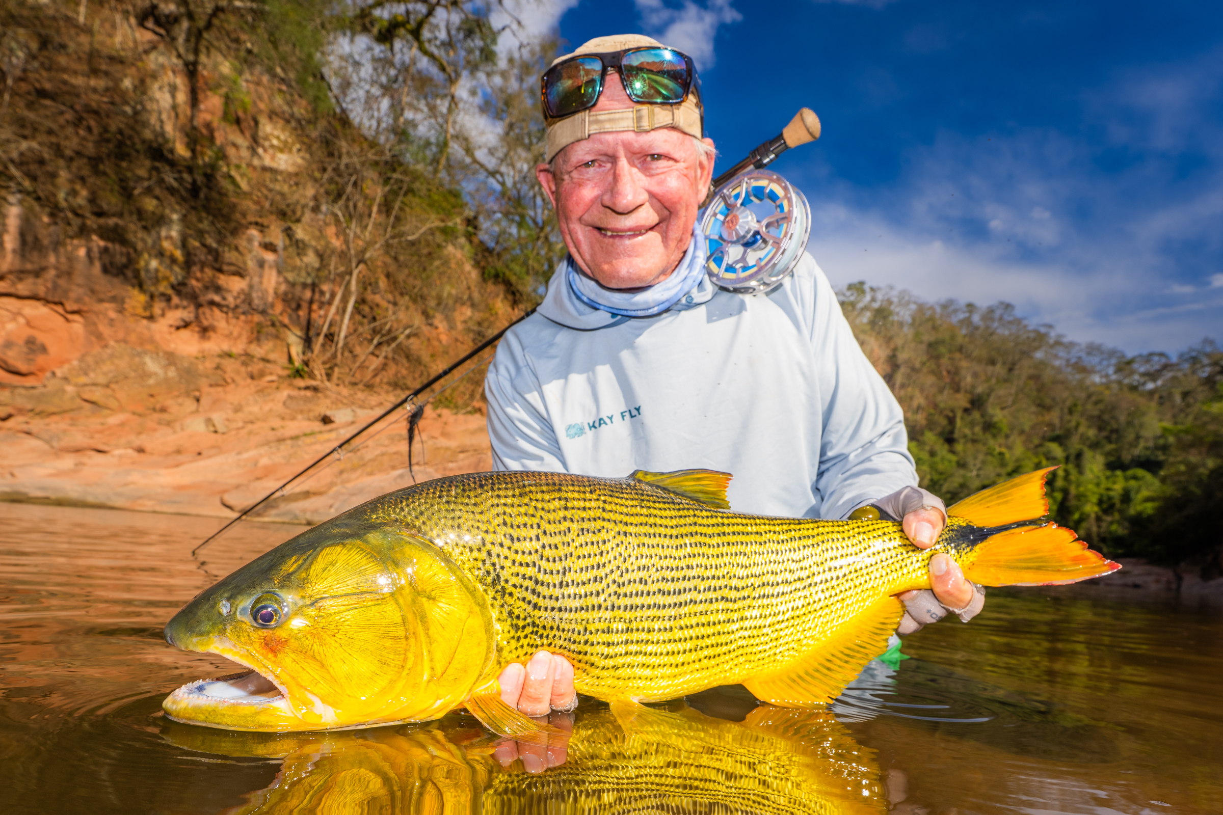 Doug with the dorado that hit in the fast water
