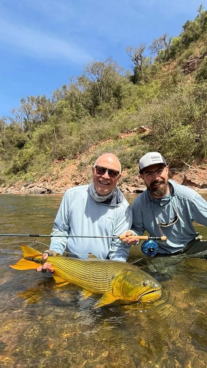 Hans and his guide with his last dorado of the week